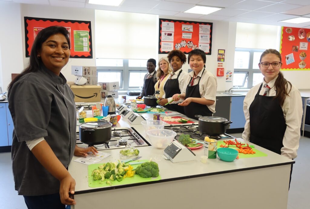 Parents cook delicious meal with the Outreach team